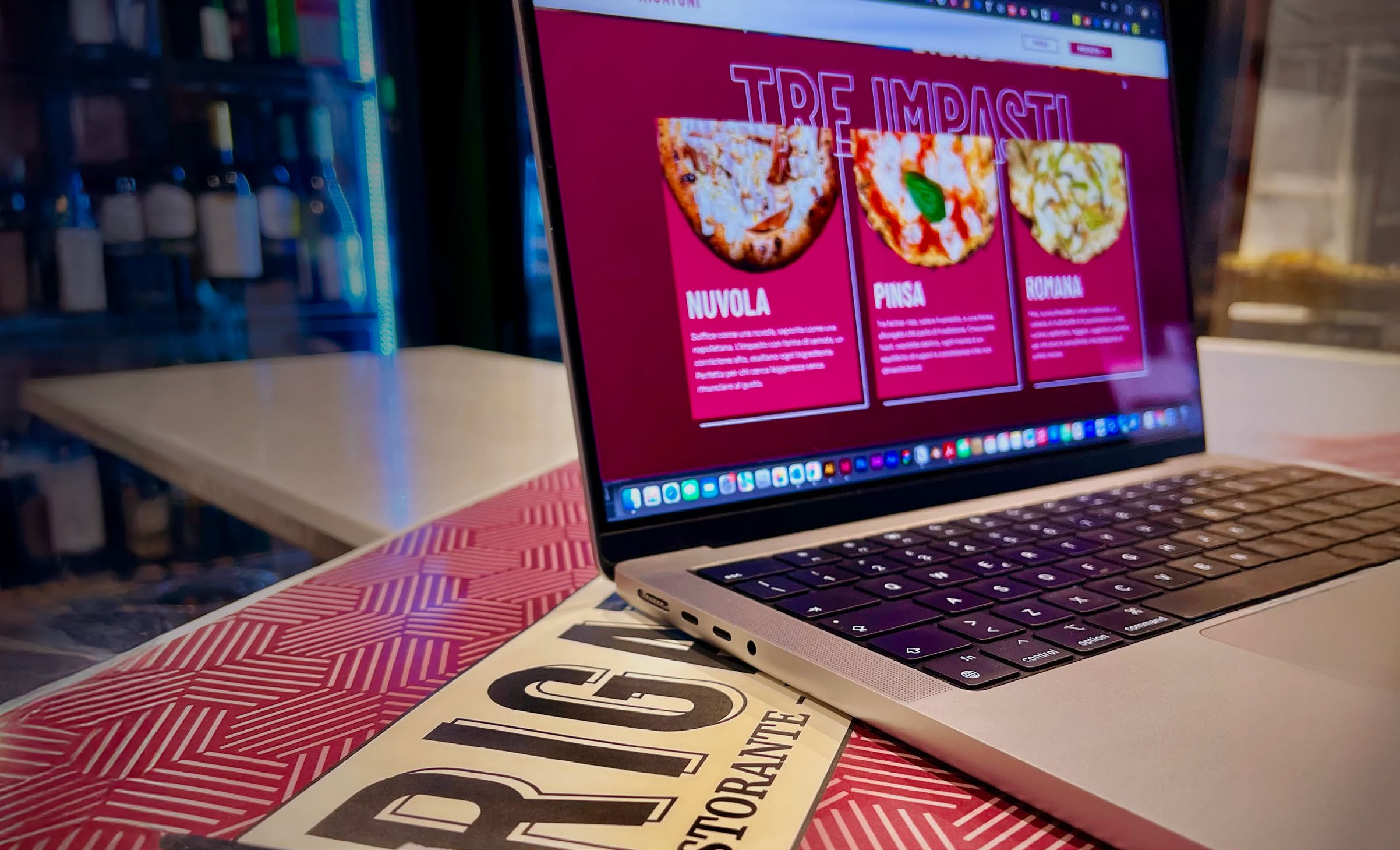 Close-up detail of the Ristorante Rigatoni pizza menu on screen